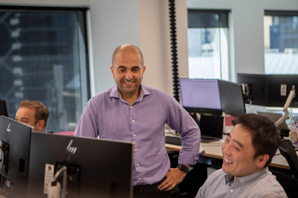 IT professionals Richard Baronessa and Leon Gu at Spiire in Melbourne.