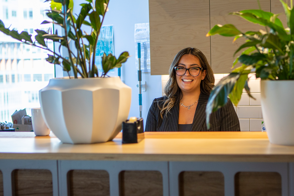 Spiire Melbourne Landscape Architecture Graduate Sarah Salerni in the kitchen breakout area.