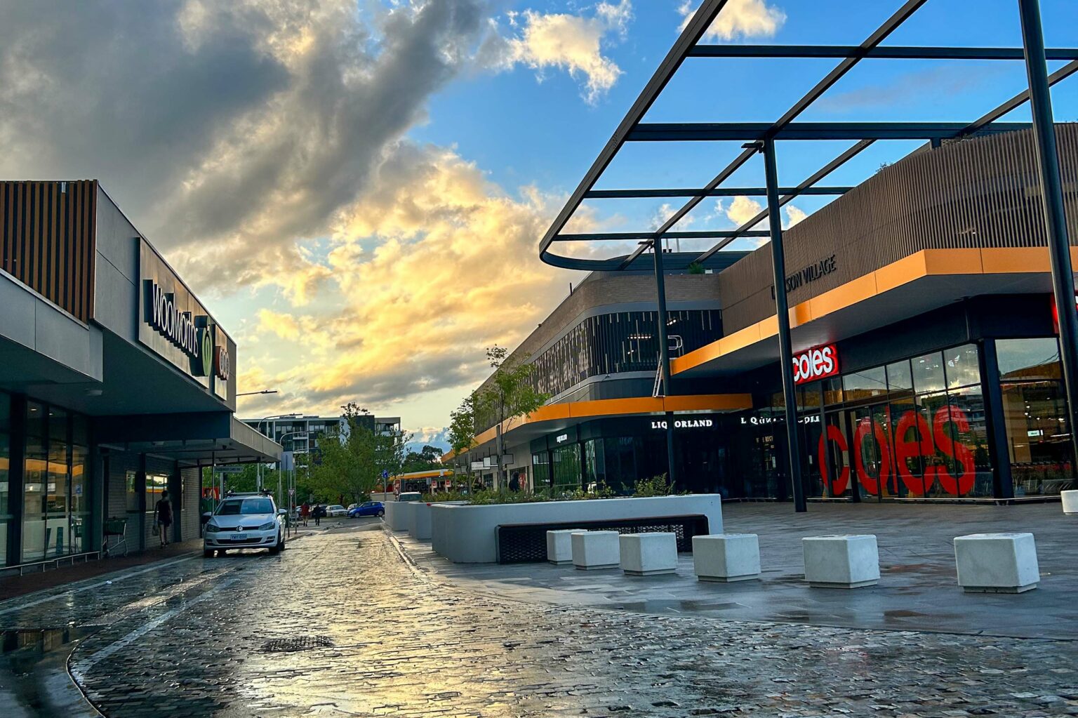 Civil engineering designs for the Coles development in Dickson considered the interface with the existing Woolworths and Dickson library.