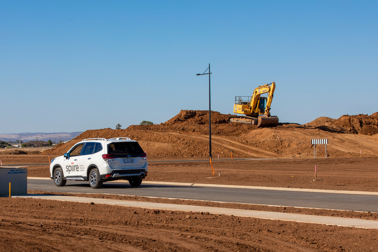 Spiire vehicle driving on civil construction site at Virginia Grove in Adelaide.